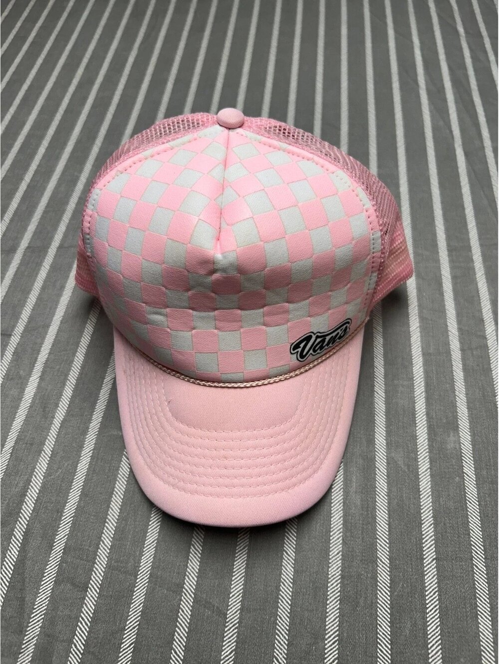 Van's pink and white checkerboard trucker hat